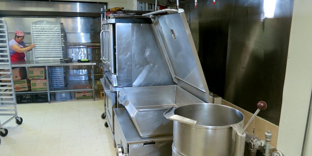 Commercial kettle and tilt skillet inside Rocky Mountain Commissary